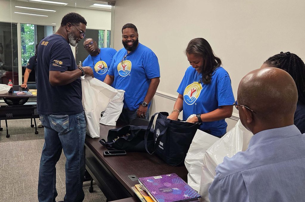 JMDLS members bagging books for donation to local classrooms