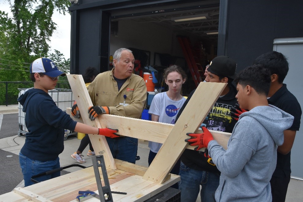 Discover how Maxx and fellow students from Magic City Acceptance Academy made a difference by volunteering with United Way Hands On. From building picnic tables to writing encouraging notes, their day of service exemplifies the rewards of giving back. Learn how this experience benefits both the community and the students themselves.